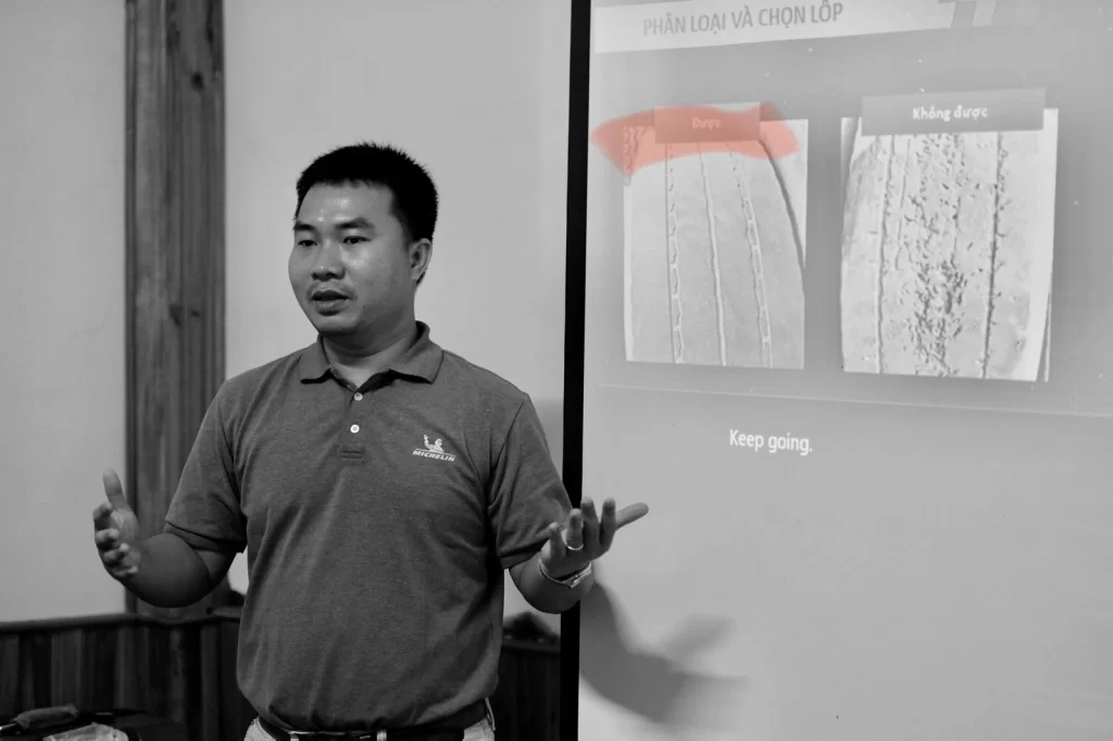 Technical training session on how to properly inspect and select tires for a regroove.